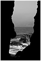 View through a seacave at the Cove. La Jolla, San Diego, California, USA (black and white)