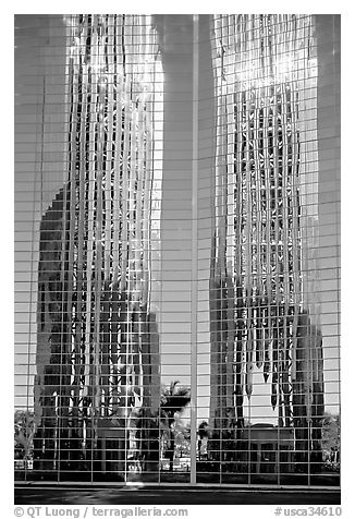 Bell tower reflected in Crystal Cathedral Facade. Garden Grove, Orange County, California, USA