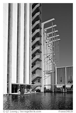 Tower and reflecting pool in the Crystal Cathedral complex. Garden Grove, Orange County, California, USA (black and white)