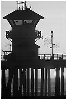 Lifeguard tower on Huntington Pier at sunset. Huntington Beach, Orange County, California, USA (black and white)