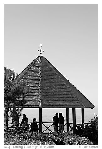 People standing in a Heisler Park Gazebo. Laguna Beach, Orange County, California, USA