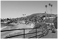 Women pushing babies in strollers in Heisler Park, above Picnic Beach. Laguna Beach, Orange County, California, USA (black and white)