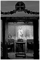 Side chapel in the Serra Chapel. San Juan Capistrano, Orange County, California, USA (black and white)