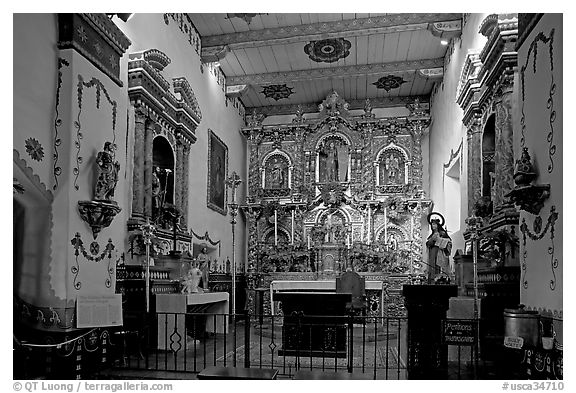 Altar and baroque retablo in the Serra Chapel. San Juan Capistrano, Orange County, California, USA (black and white)