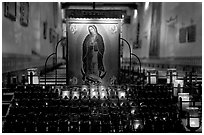 Candles and  Serra Chapel. San Juan Capistrano, Orange County, California, USA ( black and white)
