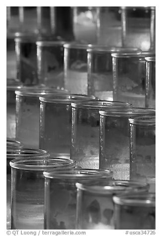 Red candles in glass, sharp. San Juan Capistrano, Orange County, California, USA