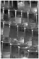 Red candles in glass, sharp. San Juan Capistrano, Orange County, California, USA ( black and white)