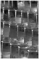 Red candles in glass, sharp. San Juan Capistrano, Orange County, California, USA ( black and white)