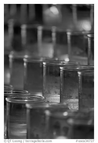 Candles in red glass, background blurred. San Juan Capistrano, Orange County, California, USA