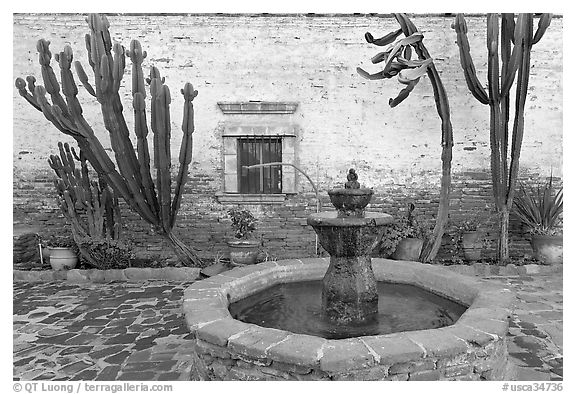 Sacred Garden, with fountain and cacti. San Juan Capistrano, Orange County, California, USA