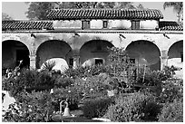 Garden and south wing arches. San Juan Capistrano, Orange County, California, USA (black and white)