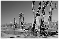 Oil extracting machinery, Chevron field. California, USA (black and white)