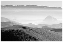 Power plant and Morro Rock seen from hills. Morro Bay, USA ( black and white)