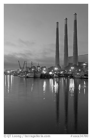 Power station reflected in harbor, dusk. Morro Bay, USA (black and white)