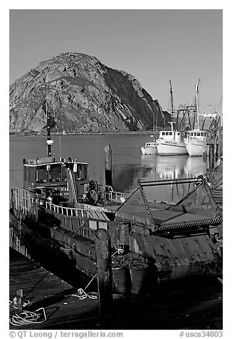 Dredge boat and Morro Rock. Morro Bay, USA (black and white)