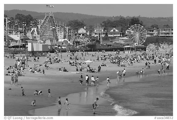 Beach and seaside amusement park on a summer afternoon. Santa Cruz, California, USA