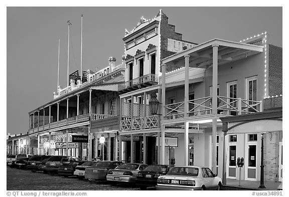 Gold-rush area buildings at night, Old Sacramento. Sacramento, California, USA (black and white)