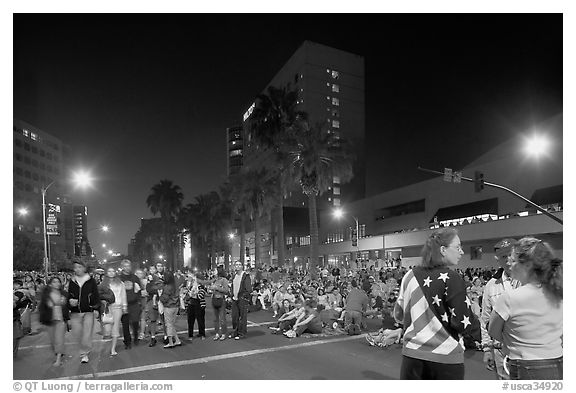 Families waiting for fireworks on Almaden street, Independence Day. San Jose, California, USA