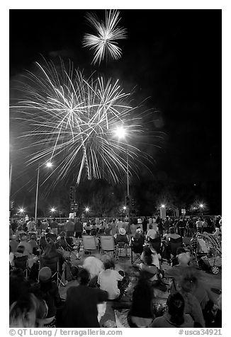 Families watching fireworks, Independence Day. San Jose, California, USA (black and white)