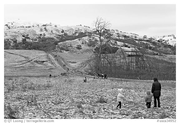 Families visiting Joseph Grant Park after a rare snowfall. San Jose, California, USA