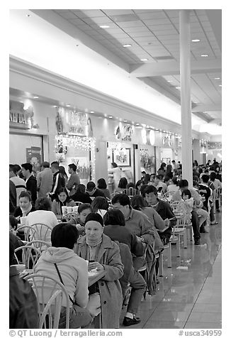 Vietnamese people in the foot court of the Grand Century mall. San Jose, California, USA (black and white)