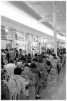 Vietnamese people in the foot court of the Grand Century mall. San Jose, California, USA (black and white)