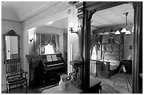 Mirror and last bedroom of Sarah Winchester. Winchester Mystery House, San Jose, California, USA ( black and white)