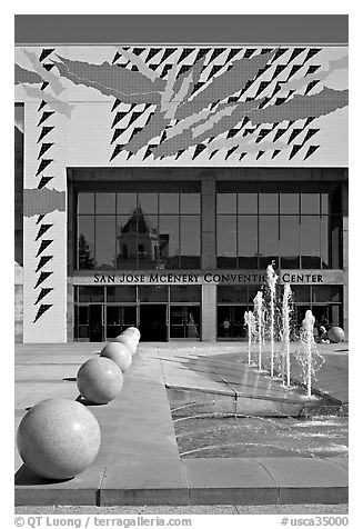 McEnery convention center and reflection of San Jose Civic Auditorium. San Jose, California, USA (black and white)