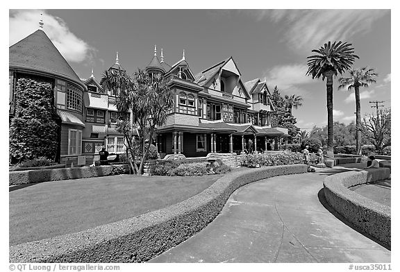 Gardens and facade. Winchester Mystery House, San Jose, California, USA (black and white)