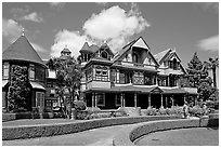 Gardens and facade, morning. Winchester Mystery House, San Jose, California, USA ( black and white)