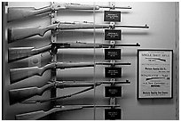 Collection of Winchester rifles. Winchester Mystery House, San Jose, California, USA (black and white)