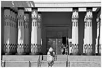 Facade of the  Rosicrucian  Egyptian Museum  with tourists entering. San Jose, California, USA (black and white)