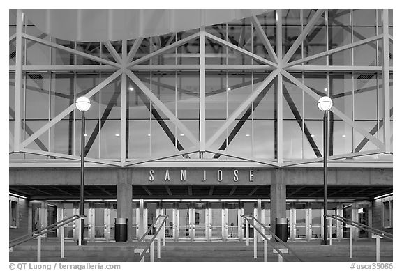 Facade of HP pavilion with San Jose sign reflecting sunset colors. San Jose, California, USA