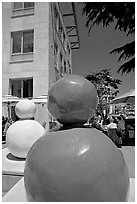 Sculptures and outdoor lunch, Castro Street, Mountain View. California, USA (black and white)