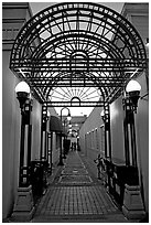 Alley and gate leading to Castro Street, Mountain View. California, USA (black and white)