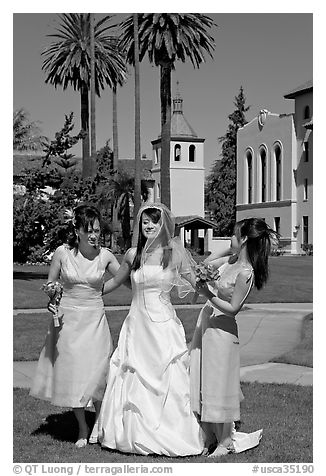 Bride and bridesmaids in front of mission, Santa Clara University. Santa Clara,  California, USA (black and white)