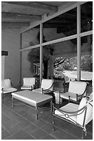 Chairs and coffee table on porch, Sunset Gardens. Menlo Park,  California, USA (black and white)