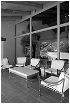 Chairs and coffee table on porch, Sunset Gardens. Menlo Park,  California, USA (black and white)