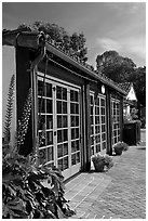 European-style glass doors and brick pavement, Allied Arts Guild. Menlo Park,  California, USA ( black and white)