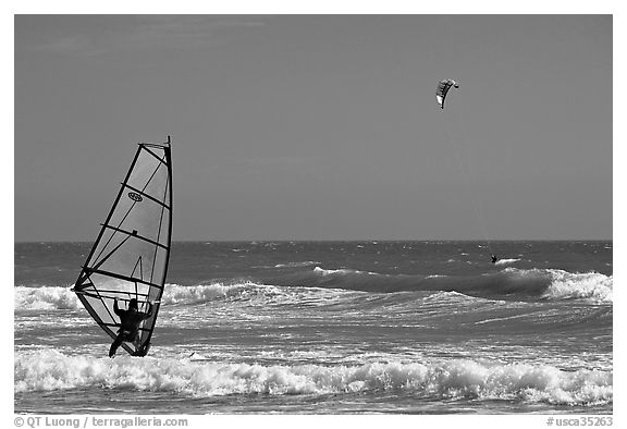 Windsurfer and kitesurfer, Waddell Creek Beach. California, USA (black and white)