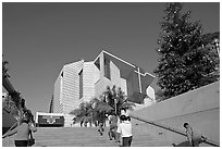 Families climbing stairs towards Cathedral of our Lady of the Angels. Los Angeles, California, USA ( black and white)