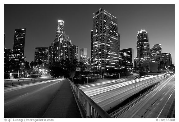 Bridge, Harbor Freeway, and skyline at nightfall. Los Angeles, California, USA (black and white)