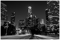 Traffic lights and skyline at night. Los Angeles, California, USA (black and white)