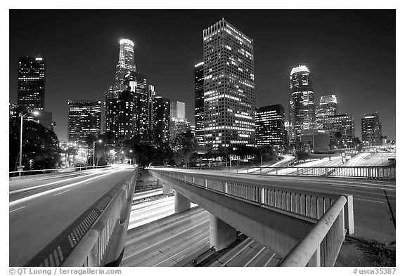 Bridge, Harbor Freeway, and skyline at night. Los Angeles, California, USA