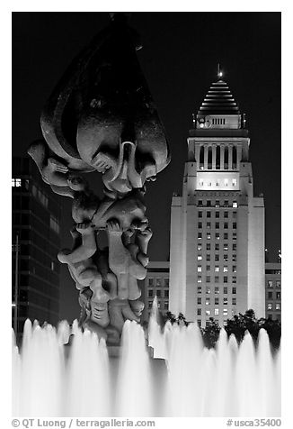 Peace on Earth sculpture, fountain, and City Hall at night. Los Angeles, California, USA (black and white)