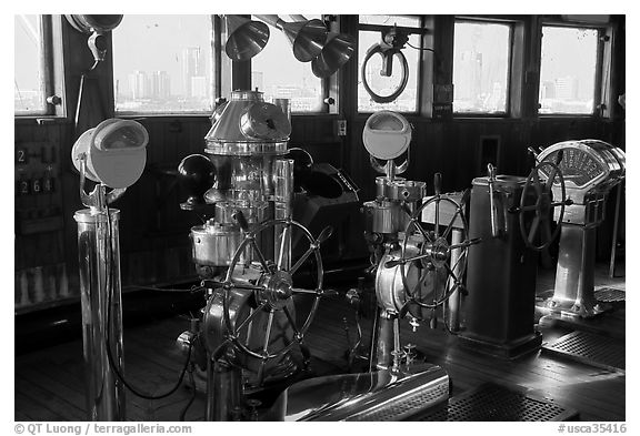 Boat bridge with navigation instruments, Queen Mary. Long Beach, Los Angeles, California, USA (black and white)