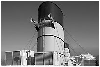 Chimneys and air input grids on the Queen Mary liner. Long Beach, Los Angeles, California, USA (black and white)