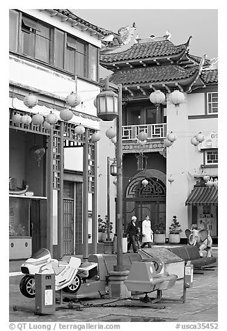 Rides and buildings in Chinese style, Chinatown. Los Angeles, California, USA (black and white)