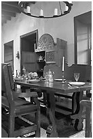 Room furnished in heavy oak in the Avila Adobe. Los Angeles, California, USA (black and white)