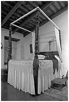 Bedroom in the Avila Adobe, Los Angeles  oldest building (1818). Los Angeles, California, USA (black and white)